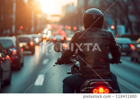 A man rides a motorcycle in city traffic, View from the back, Close-up 118431800