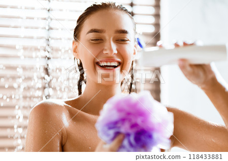 Taking Shower. Young Girl Putting Shower Gel On Puff Taking Shower. Young Girl Putting Shower Gel On Puff 118433881