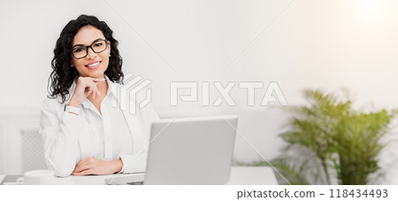 Job Interview. Hispanic HR manager recruiting employees, smiling at camera, listening to you, copyspace 118434493