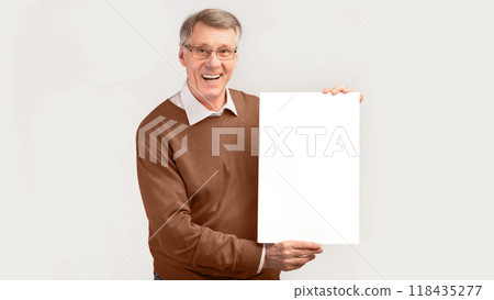 Smiling Senior Man Holding Blank White Poster Standing Over Studio Background. Mockup, Panorama 118435277