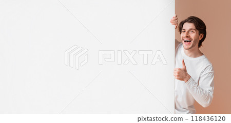 Happy Interracial Couple Holding White Advertising Board And Showing Thumbs Up, Recommending Something Over Yellow Studio Background, Free Space Happy Interracial Couple Holding White Advertising Board And Showing Thumbs Up, Recommending Something Over Yellow Studio Background, Free Space 118436120