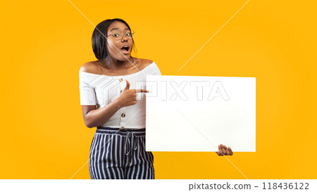 African American Lady Pointing Finger Holding Blank White Board Posing Over Orange Studio Background. Panorama, Mockup 118436122