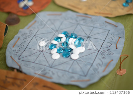 Reproduction of Ancient Roman Game with Blue and White Glass Playing Pieces Reproduction of Ancient Roman Game with Blue and White Glass Playing Pieces 118437366