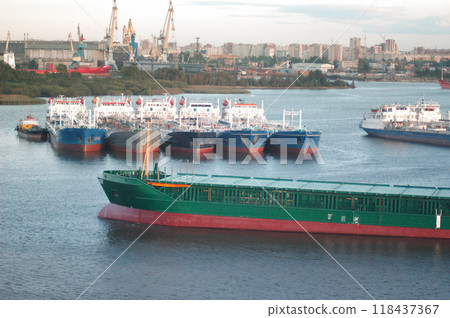 Industrial Harbor Scene with Ships and Cranes in Saint Petersburg, Russia Industrial Harbor Scene with Ships and Cranes in Saint Petersburg, Russia 118437367