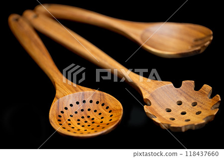 wooden kitchen spatulas isolated 118437660