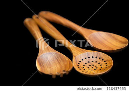 wooden kitchen spatulas isolated wooden kitchen spatulas isolated 118437663
