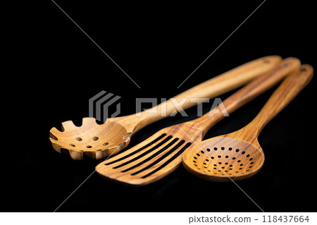 wooden kitchen spatulas isolated wooden kitchen spatulas isolated 118437664