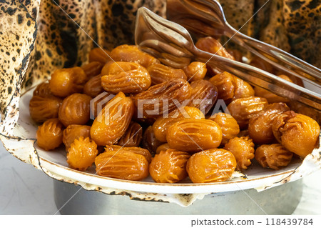 Tulumba - Turkish sweets. Close-up. Restaurant menu. Tulumba - Turkish sweets. Close-up. Restaurant menu. 118439784