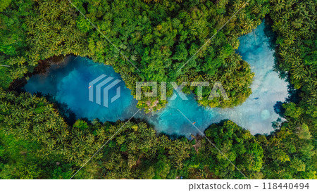 Most transparent lake with crystal fresh water in Sulawesi, Indonesia. Drone view Most transparent lake with crystal fresh water in Sulawesi, Indonesia. Drone view 118440494