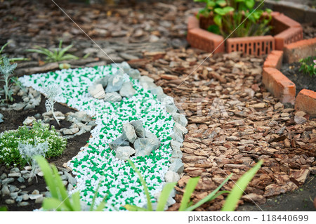 Flower bed border design at beautiful home garden 118440699