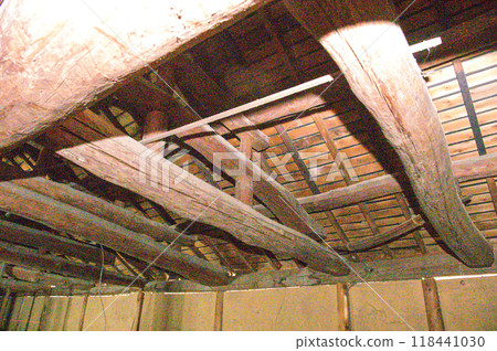 Beams and pillars in the attic of a 100-year-old traditional house 118441030