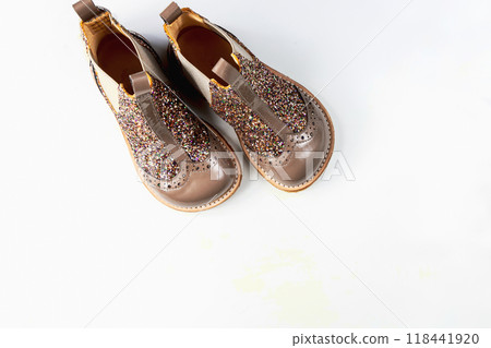 Little kids boots with glitter on white 118441920