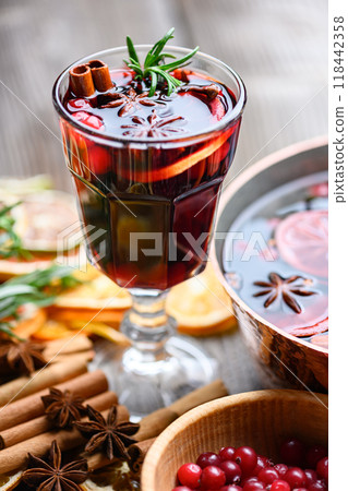 Close up of mulled wine in glass with sugar decoration 118442358