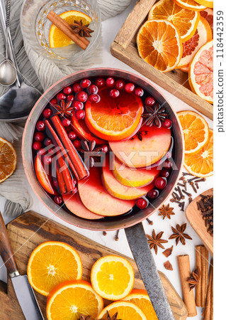 Copper pot full of red mulled wine Copper pot full of red mulled wine 118442359