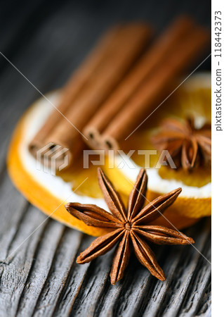 Creative Christmas aromatic concept with cinnamon sticks Creative Christmas aromatic concept with cinnamon sticks 118442373