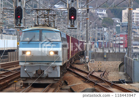 A freight train passing through Mihara Station on the Sanyo Main Line (pulled by EF66 No. 100 locomotive) A freight train passing through Mihara Station on the Sanyo Main Line (pulled by EF66 No. 100 locomotive) 118443947