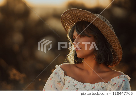 Portrait of Young Stylish Feminine Woman In Vintage Dress, Straw Hat On Nature. 118447766
