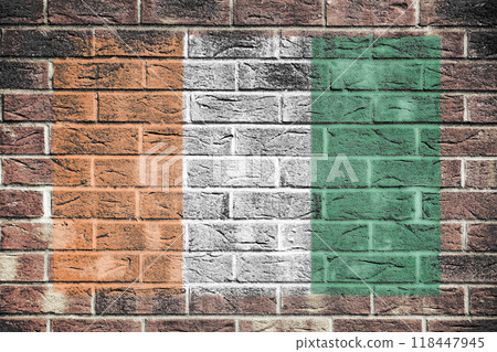 An Ivory Coast Cote DIvoire flag on an old brick wall An Ivory Coast Cote DIvoire flag on an old brick wall 118447945