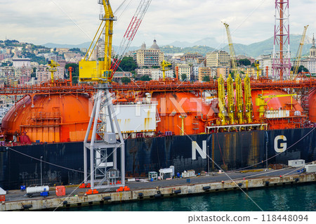 Genoa, Italy- May 27, 2024: LNG tanker FSRU Toscana Livorno, IMO 9253284, moored at Genoa port Genoa, Italy- May 27, 2024: LNG tanker FSRU Toscana Livorno, IMO 9253284, moored at Genoa port 118448094