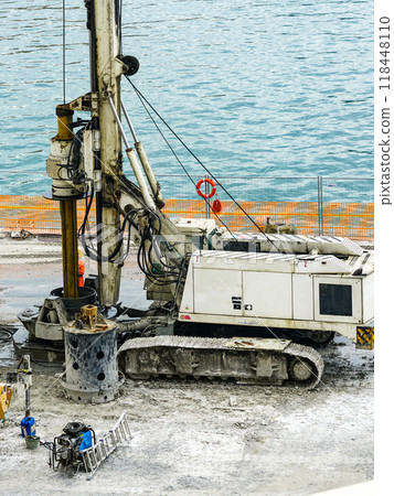 Installation of pile casings in the port quay, drilling rig, port infrastructure upgrade works 118448110