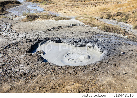 photo of a mud volcano eruption, landscape photography 118448116
