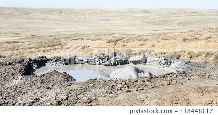photo of a mud volcano eruption, landscape photography 118448117