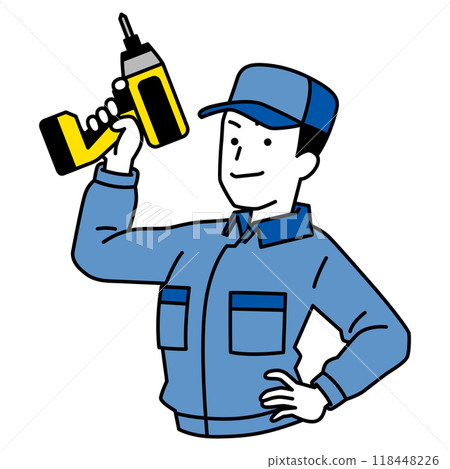 A man in overalls holding an impact driver 118448226