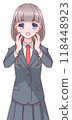 A surprised high school girl in uniform holding her cheek 118448923