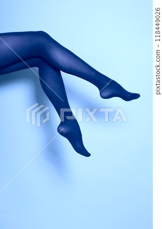 Beautiful woman legs in blue tights Beautiful woman legs in blue tights 118449026