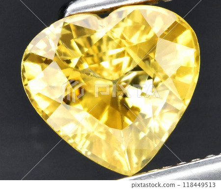 Radiant Heart-Shaped Yellow Gemstone with Brilliant Facets Radiant Heart-Shaped Yellow Gemstone with Brilliant Facets 118449513