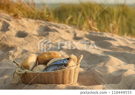 Christianity, religion, Bible concept. Five loaves of bread and two fish Christianity, religion, Bible concept. Five loaves of bread and two fish 118449555