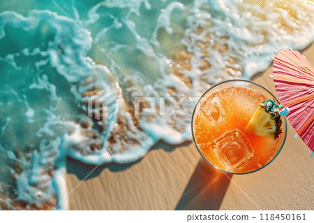 Tropical Drink by the Beach. A refreshing cocktail with ice by the sea on a sunny day. 118450161