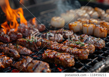 Sizzling Barbecue Grill. Delicious skewered meats and vegetables grilling over flames Sizzling Barbecue Grill. Delicious skewered meats and vegetables grilling over flames 118450211