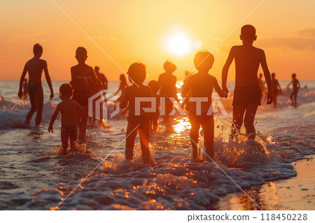 Sunset Beach Gathering. Silhouetted people enjoying a beach at sunset with waves and sand. Sunset Beach Gathering. Silhouetted people enjoying a beach at sunset with waves and sand. 118450228