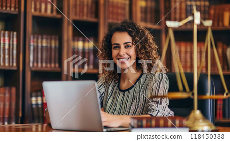 Smiling Woman at Work in a Legal Library 118450388