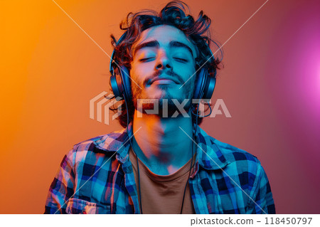 Man Enjoying Music in Vivid Neon Lights Man Enjoying Music in Vivid Neon Lights 118450797