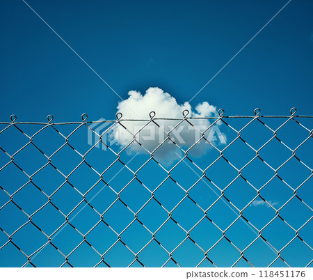 Cloud Captured Behind Chain-Link Fence Cloud Captured Behind Chain-Link Fence 118451176