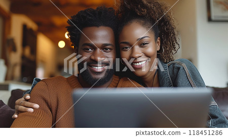 Smiling Couple with Laptop Smiling Couple with Laptop 118451286