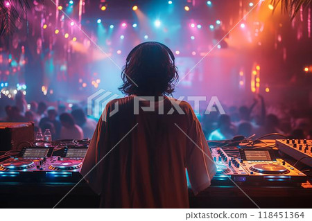 DJ at the Turntable in a Vibrant Club Setting DJ at the Turntable in a Vibrant Club Setting 118451364