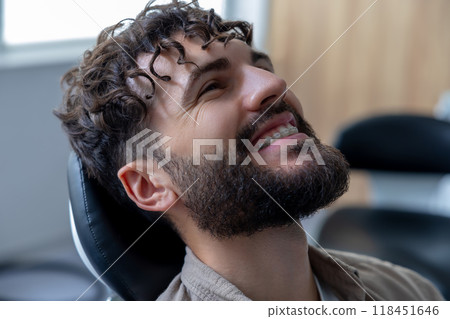 Male patient visiting doctor for dental treatment examining teeth and oral hygiene 118451646