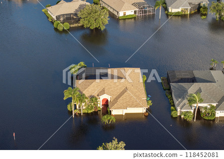 Flooded residential area with underwater houses and cars from hurricane Debby rainfall water in Laurel Meadows community in Sarasota, Florida. Aftermath of natural disaster in southern USA 118452081