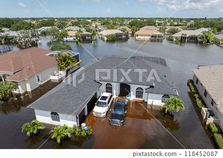 Flooding in Florida caused by tropical storm from hurricane Debby. Suburb houses in Laurel Meadows residential community surrounded by flood waters in Sarasota. Aftermath of natural disaster 118452087