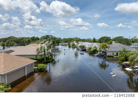 Flooding in Florida caused by tropical storm from hurricane Debby. Suburb houses in Laurel Meadows residential community surrounded by flood waters in Sarasota. Aftermath of natural disaster 118452088