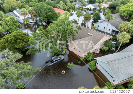 Hurricane Debby flooded homes and cars in residential community in Sarasota, Florida. Aftermath of natural disaster Hurricane Debby flooded homes and cars in residential community in Sarasota, Florida. Aftermath of natural disaster 118452097