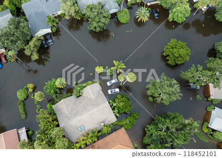 Hurricane Debby tropical rainstorm flooded residential homes and cars in suburban community in Sarasota, Florida. Aftermath of natural disaster Hurricane Debby tropical rainstorm flooded residential homes and cars in suburban community in Sarasota, Florida. Aftermath of natural disaster 118452101