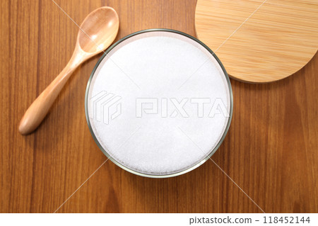 Sugar in a clear container 118452144