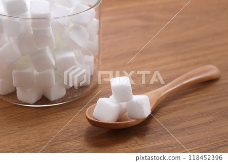 Sugar cube on spoon Sugar cube on spoon 118452396