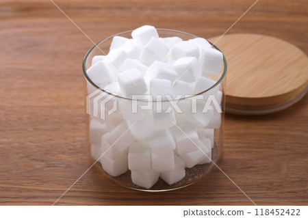 Sugar cubes in a transparent container Sugar cubes in a transparent container 118452422