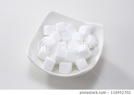 Sugar cubes in a white plate Sugar cubes in a white plate 118452702