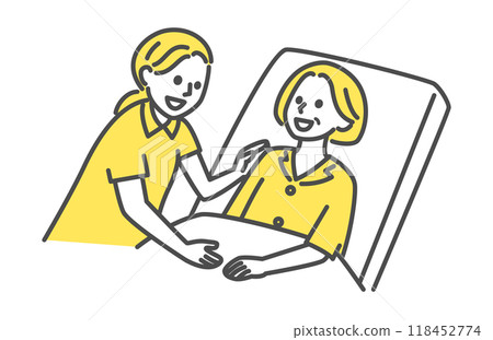 Caregiver helping a woman lying in bed 118452774